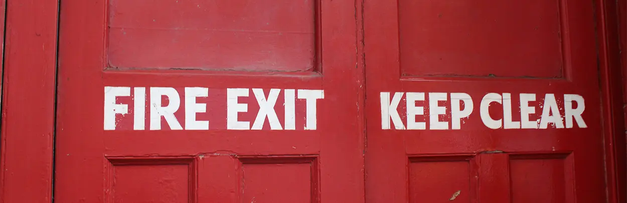 Photo of the fire exit by Ivy.D Design on Unsplash